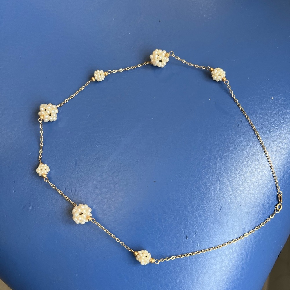 Elegant Gold and Cream Beaded Necklace